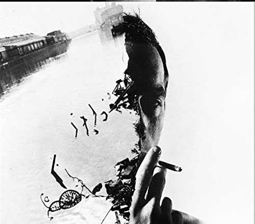 Black and white album cover featuring a man smoking with a blurred cityscape.