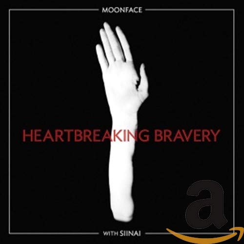Black album cover with a pale hand reaching up and red text.