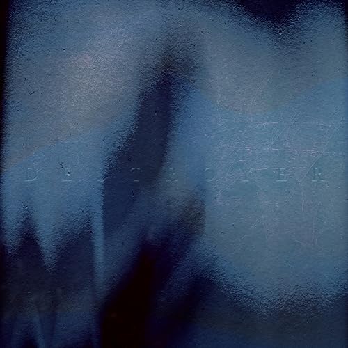 Dark blue vinyl record cover with blurred, textured lettering.