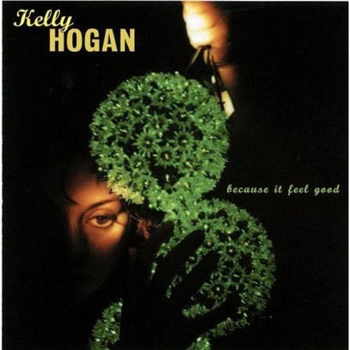 CD cover for Kelly Hogan’s “Because It Feel Good” with floral imagery.