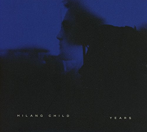 CD cover: dark blue, blurry portrait of a person, text "Hilang Child Years".