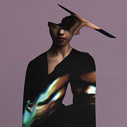 Abstract portrait of a person with distorted, colorful overlays.