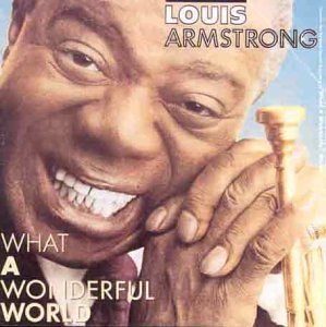 Louis Armstrong smiling, holding a trumpet, album cover for “What a Wonderful World”.