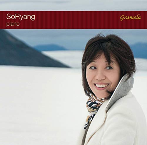 CD cover featuring a smiling woman with dark hair and a winter coat.