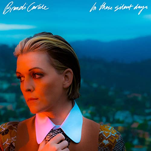 Brandi Carlile album cover, portrait with mountains in the background.