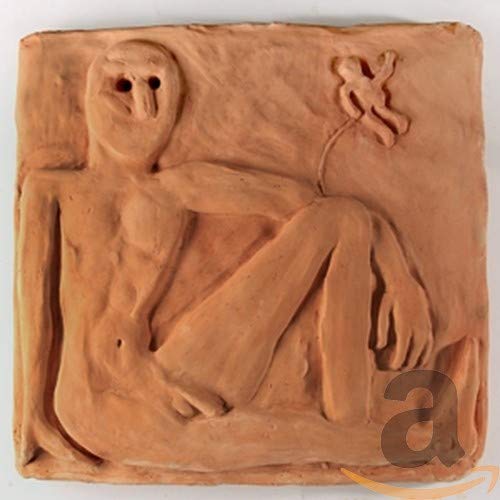 CD cover with a textured, terracotta-colored relief of reclining figures.