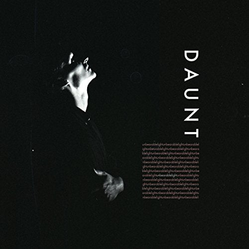 Black and white album cover featuring a man looking upwards with text.
