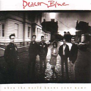 Deacon Blue band portrait in black and white, street scene background.