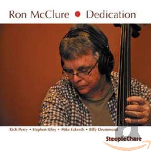 Ron McClure album cover: bassist with headphones, reddish-brown background.