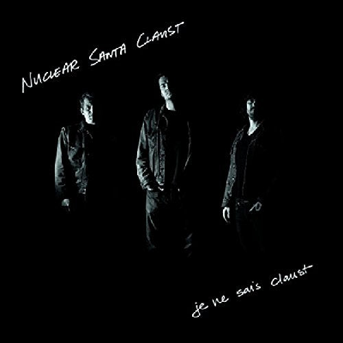 Black and white album cover featuring three figures and text.