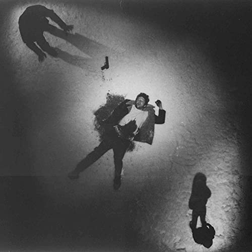 Black and white album cover depicting a person falling with shadows.