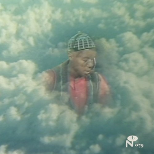 Laraaji portrait with cloudy blue background, album cover art.