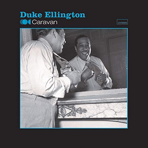 Duke Ellington album cover, black and white photo of two men tying ties.