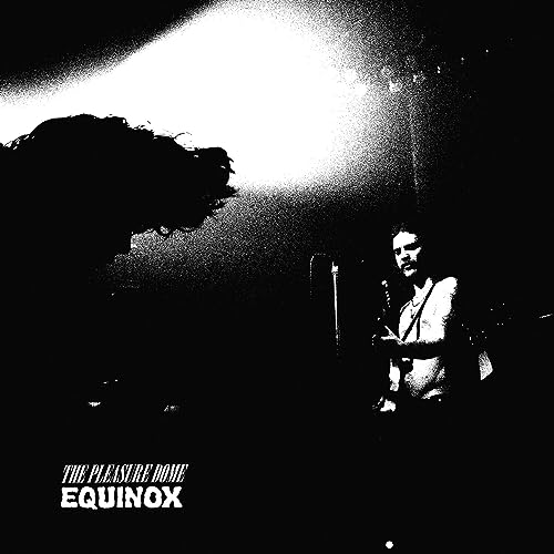 Black and white album cover featuring a man with long hair, silhouetted.