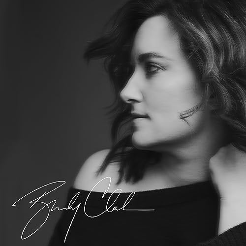 Black and white portrait of Brandy Clark with handwritten signature.