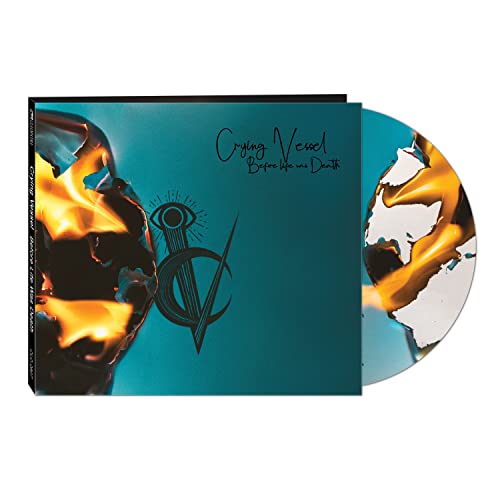 CD case with cracked, yellow-and-black abstract design and central eye symbol.