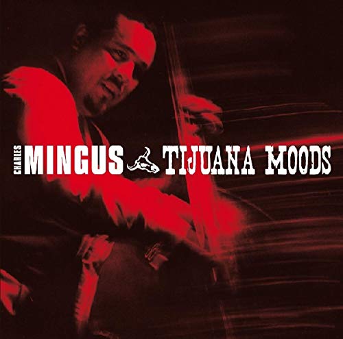 Charles Mingus portrait on album cover, playing double bass, red highlights.