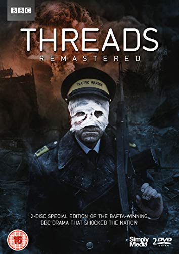 DVD cover for "Threads," depicting a masked man in a ruined cityscape.