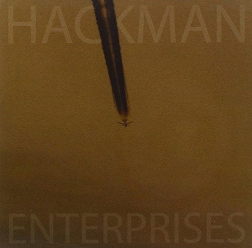 CD cover for "Hackman - Enterprises" with a small airplane image.