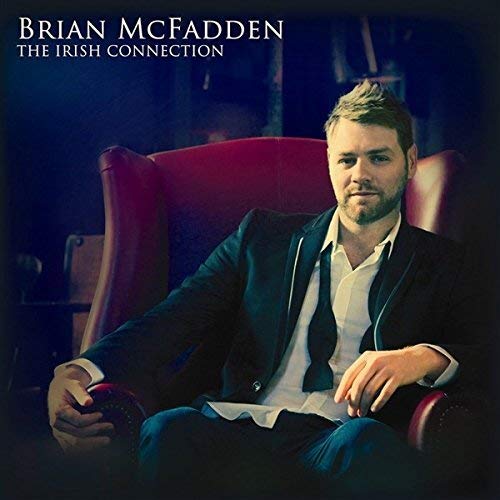 Brian McFadden album cover featuring the artist seated in a red chair.