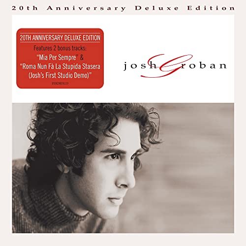 Josh Groban CD cover: portrait of a young man with curly hair.