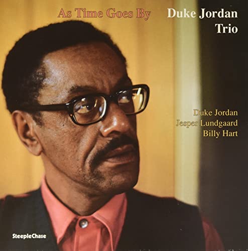 Duke Jordan album cover, portrait of a jazz pianist wearing glasses.