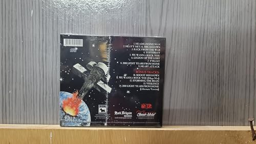 CD back cover with airplane illustration and tracklist text.