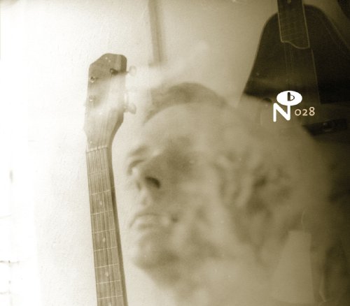 Sepia-toned album cover featuring a blurred portrait and guitar neck.