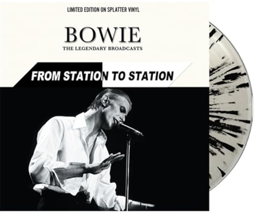 David Bowie album cover and marbled vinyl record shown at an angle.
