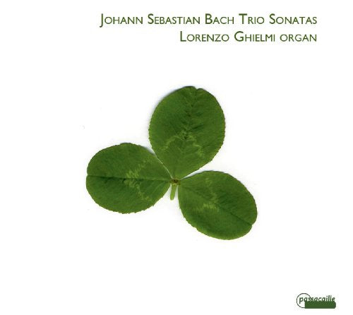 CD cover featuring a four-leaf clover against a white background.