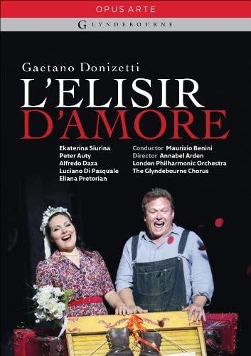 DVD cover for Donizetti’s *L’elisir d’amore* opera, featuring singers in costume.