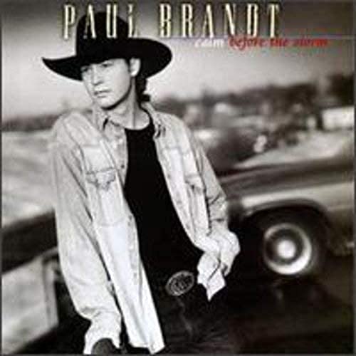 CD cover featuring Paul Brandt in a cowboy hat and plaid shirt.