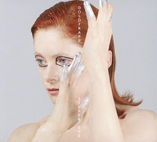 Goldfrapp album cover: woman with silver paint covering face and hands.