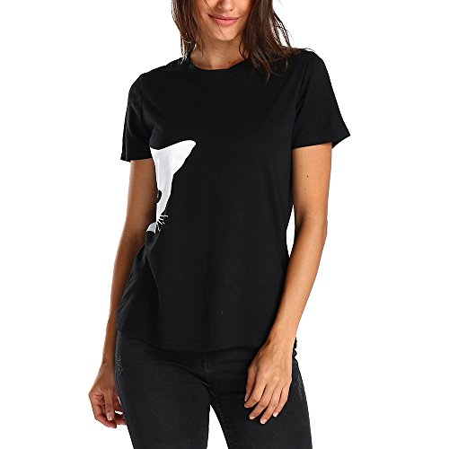 Woman wearing a black t-shirt with a white cat face graphic.