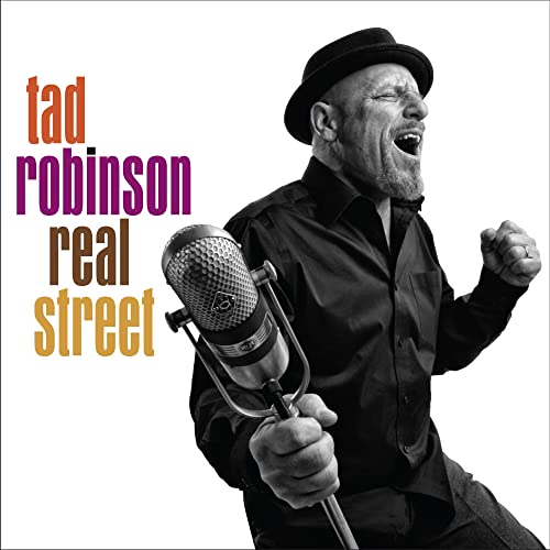Tad Robinson album cover: singer with microphone, black and white portrait.