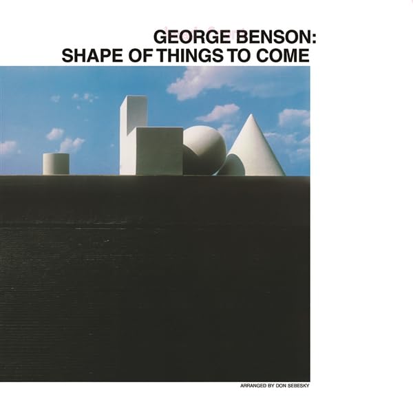 George Benson album cover: abstract geometric shapes against a blue sky.