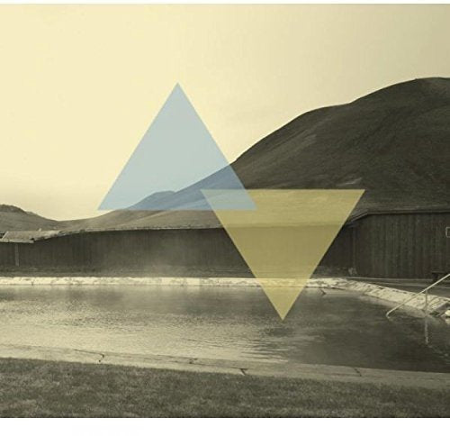 Album cover with a pool, mountains, and overlapping blue and yellow triangles.