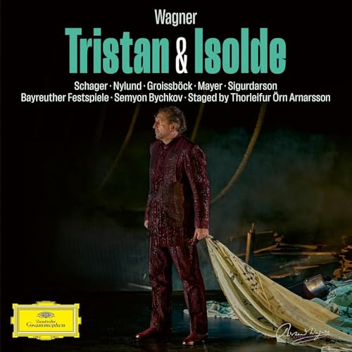 Opera scene with a man in red, blurred background, Deutsche Grammophon label.