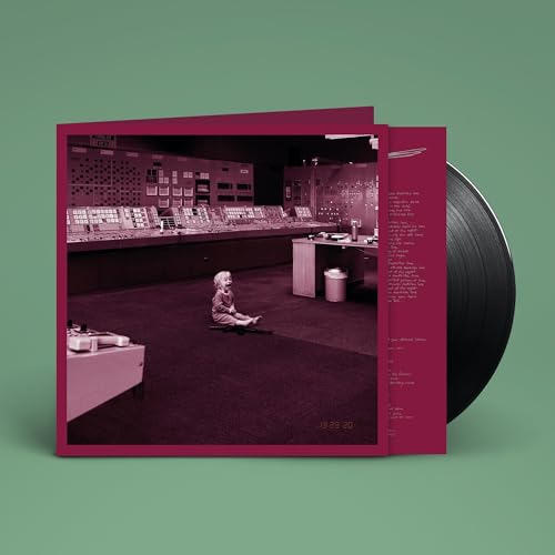 Vinyl record with cover art depicting a child in a control room.