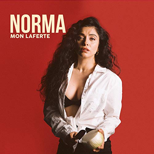 Mon Laferte album cover, "Norma," featuring a portrait against red.