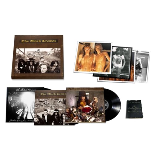 Black Crowes "Southern Harmony" vinyl box set with photos and records.
