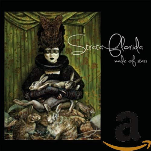 CD cover: woman with rabbits, ornate headdress, green backdrop.