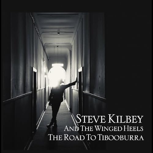 Black and white album cover featuring a figure in a hallway.