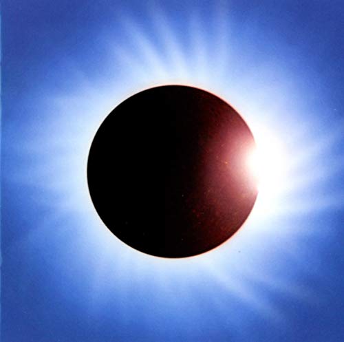 CD cover: Solar eclipse with a dark center and bright corona.