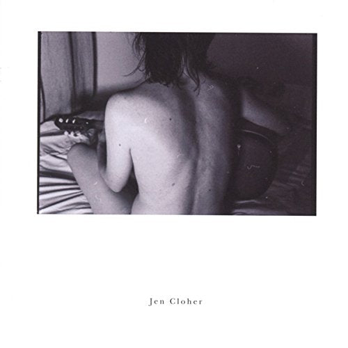 Black and white album cover featuring a person with a guitar.