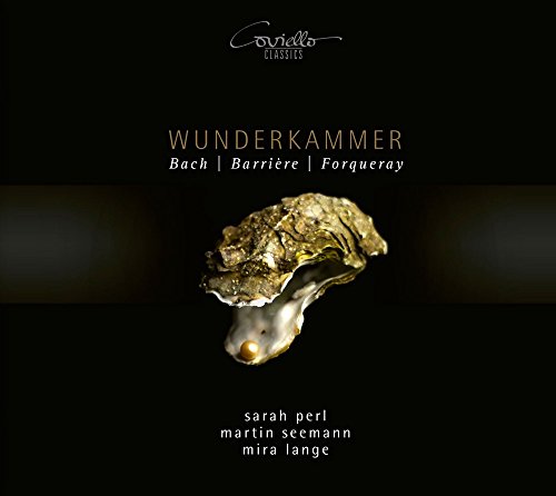 CD cover: black background with golden oyster shell and text.
