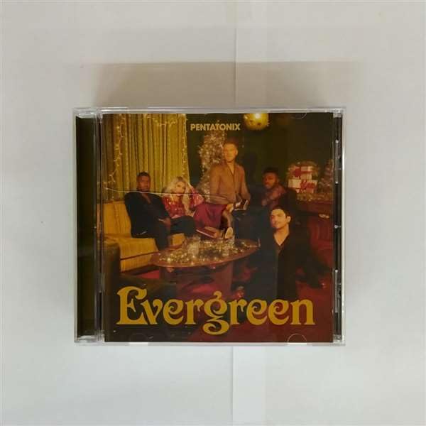 Pentatonix “Evergreen” CD case with group portrait and gold lettering.