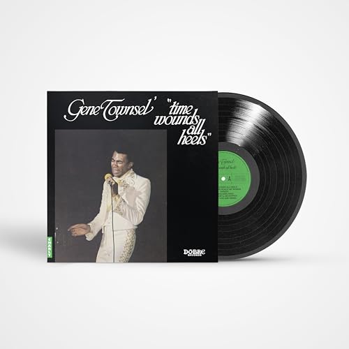 Vinyl record of Gene Townsley’s “Time Wounds All Heels” with portrait.