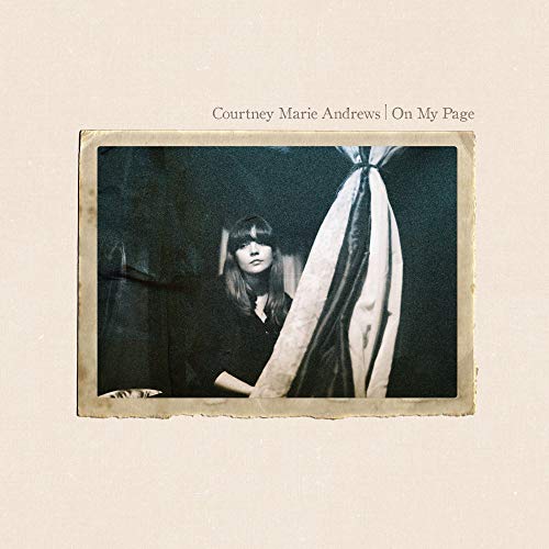 CD cover: woman with bangs, draped fabric, vintage photo aesthetic.
