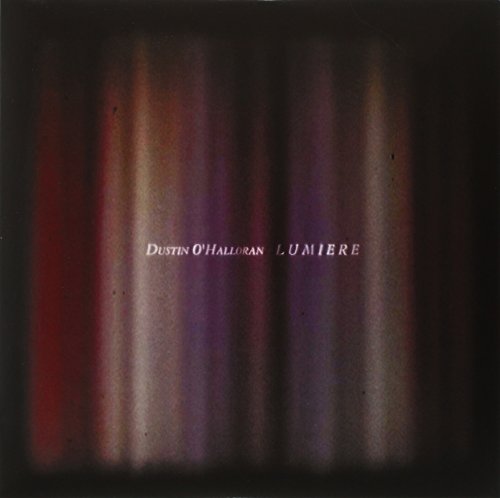 Dustin OāHalloranās āLumiereā vinyl album cover with blurred, colorful vertical stripes.